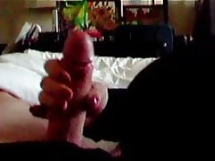 My slutty wife stroking cock in a hotel room