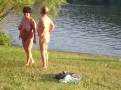 Huge nudist mature tits stroll back from water